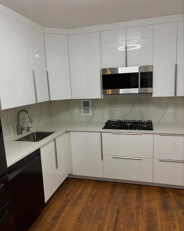 Restored kitchen with white cabinets after water damage in West York